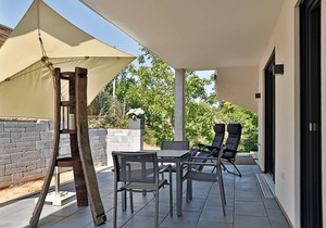 2 holiday apartments equipped with a four-star plus hotel room.