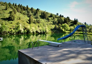 7,000 SQ FT CABIN ON 150 ACRES PRIVACY WITH ITS OWN PRIVATE LAKE.