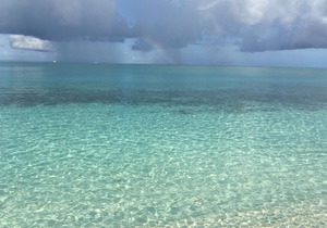 A few steps from the door and you're on Grace Bay Beach!