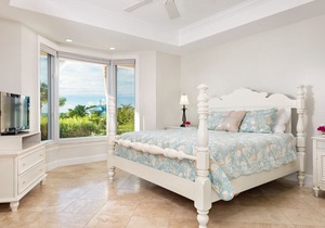 A few steps from the door and you're on Grace Bay Beach!