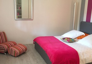 A walk from the beaches and shops.