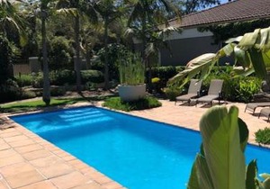 African Palm Cottage and Guesthouse