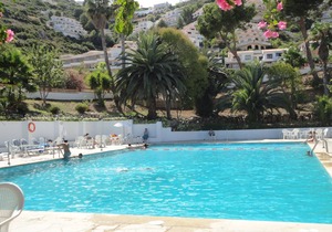 Air-conditioned apartment close to the page, wifi, private parking. 4 Pax