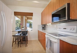 Amenity Centric Contemporary Top Floor Condo