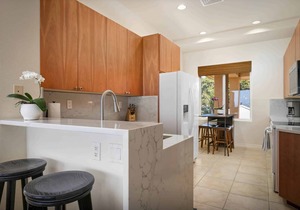 Amenity Centric Contemporary Top Floor Condo