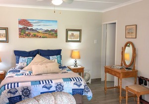 Apartment in large tropical garden with pool and sea view