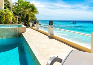 August Special oceanfront apartment Bellevue 1 with private sandy beach & pool