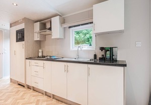 Beautiful chalet in the woods with a shared pool