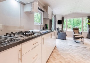 Beautiful chalet in the woods with a shared pool