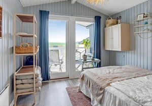 Beautiful cottage in the greenery with sea view, located in a small cottage area.