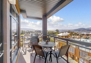 Bright Corner Unit with Lake and Pool Views 543