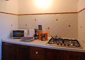 Casa Bonannia P: A bright two-story apartment in the characteristic style of the Tuscan countryside.