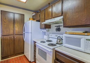 Charming condo with a hot tub, sauna, balcony, deck, game room, & gas fireplace