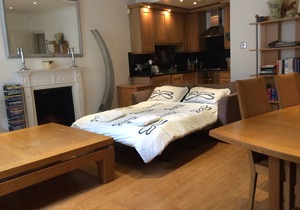 Charming large and cosy garden apartment in Earls Court, Chelsea