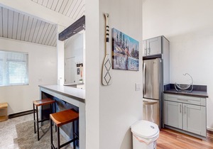 Charming, two-story ski condo w/a wood stove, free WiFi, shared pool, & hot tub