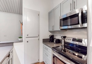 Charming, two-story ski condo w/a wood stove, free WiFi, shared pool, & hot tub