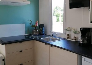 Comfortable chalet with microwave, on a holiday park 1 km. from the beach
