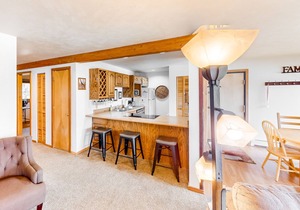 Comfy condo with furnished patio, & wood-burning fireplace