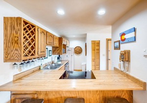 Comfy condo with furnished patio, & wood-burning fireplace