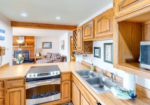 Comfy condo with furnished patio, & wood-burning fireplace
