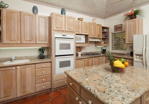 Commanding views of the verdant fairway and the Caribbean Sea beyond, is Casuarina House