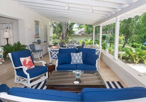 Commanding views of the verdant fairway and the Caribbean Sea beyond, is Casuarina House