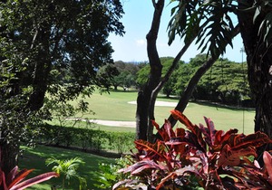 Commanding views of the verdant fairway and the Caribbean Sea beyond, is Casuarina House