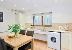 Contemporary cottage style single storey lodge.