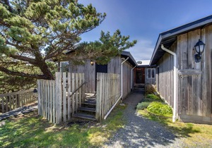 Dog-friendly, oceanfront home w/ beach access, cozy fireplace, and large deck