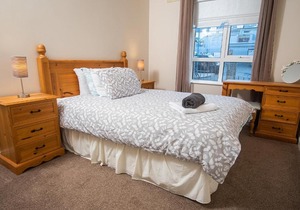 Elegant Two Bedroom apartment at the beach and waves.