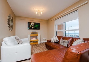 Elegant Two Bedroom apartment at the beach and waves.