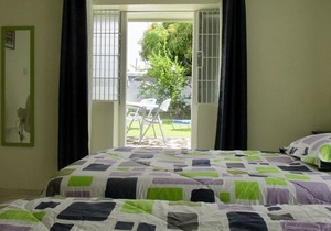 Enjoy A Peaceful Vacation Steps away from a Pristine Beach On The West Coast.