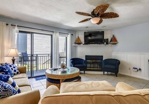 Enjoy this updated townhome with views of the gulf and pool from the deck.