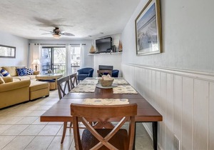 Enjoy this updated townhome with views of the gulf and pool from the deck.