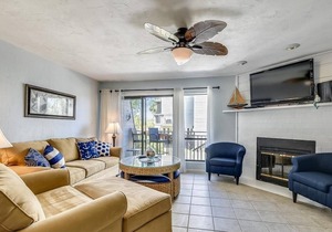 Enjoy this updated townhome with views of the gulf and pool from the deck.