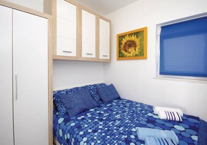 Excellent location directly on the sea and on a pebble beach makes this beautifully furnished apartm