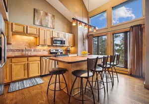 Experience 4 O'Clock Lodge A16 condo in Breckenridge with mountain views and hot tub access!