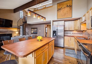 Experience 4 O'Clock Lodge A16 condo in Breckenridge with mountain views and hot tub access!