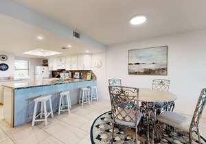 Fully Renovated Getaway with Beachfront Patio - Steps to Pool & Hot Tub