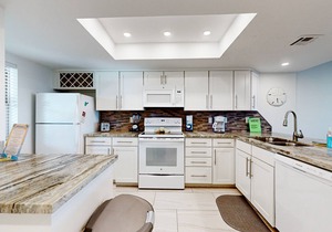 Fully Renovated Getaway with Beachfront Patio - Steps to Pool & Hot Tub