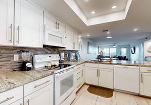 Fully Renovated Getaway with Beachfront Patio - Steps to Pool & Hot Tub