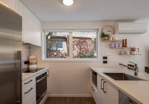 Hillside Villa 2 – Modern 2BR Walk to Town & A/C