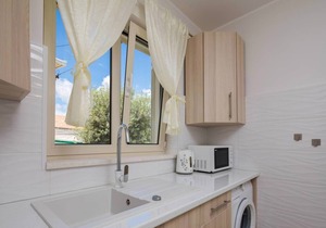 Holiday apartment with terrace and air conditioning