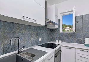 Holiday home with heated pool and sea views in a quiet location and three bedrooms