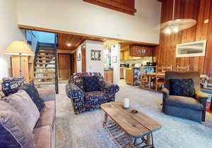 Homey Condo, Right Across from The Village! Forested Setting & Balcony