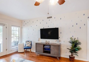 Lake-view condo in gated 14-acre community with private marina, pools, & hot tub