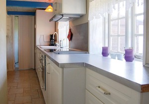 Look forward to a relaxing holiday in this charming holiday home with a traditional thatched roof.