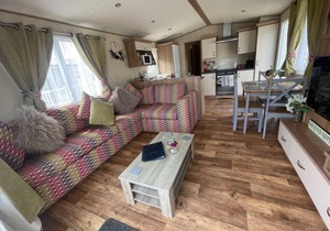 Luxury lakeside caravan situated on award winning park Tattershall Lakes,private Fishing Peg,Hot tub
