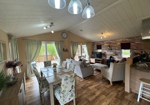 luxury lakeside lodge with a sunken hot tub on bull rush a peaceful feature lake @Tattershall lakes