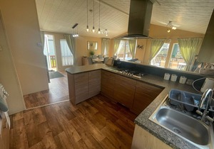 luxury lakeside lodge with a sunken hot tub on bull rush a peaceful feature lake @Tattershall lakes